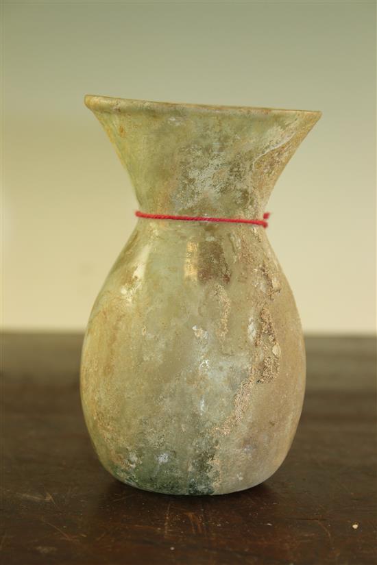 An Islamic glass vase, c.9th century A.D., 13cm, repair